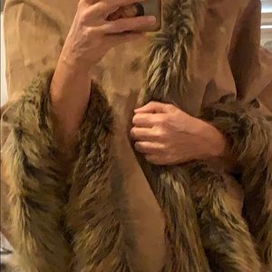 Suede cape with faux fur trim. L